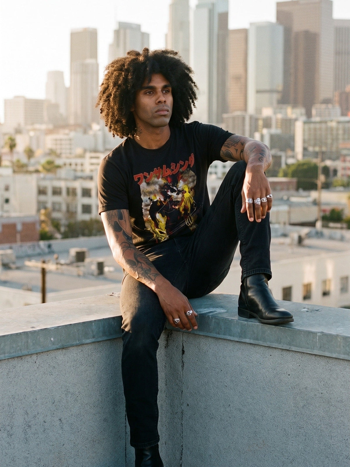 Model wearing the Wan Samu Shingu tee on an LA rooftop at golden hour